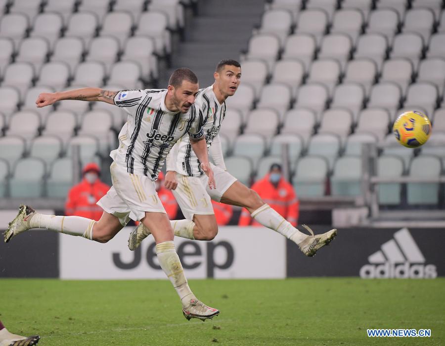 FC Juventus' Leonardo Bonucci (left) scores his goal during a Serie A football match between FC Juventus and Torino in Turin, Italy on Saturday.