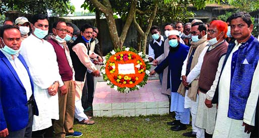 Manoranjan Shil Gopal, MP, pays tribute to Shaheed Mohsin Ali by placing wreaths at his grave at the Tajmahal intersection in Dinajpur town on Sunday as on this day in 1971 the Birganj Upazila of the district was freed from the clutches of Pakistani Occup