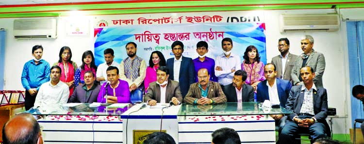 Newly elected President of Dhaka Reporters Unity Morsalin Nomani presides over the charge handing over ceremony to the new committee at DRU on Monday.