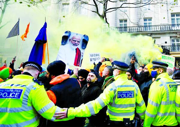 British Sikhs gather to protest against India's new farming legislation, outside the High Commission of India in London, Britain.