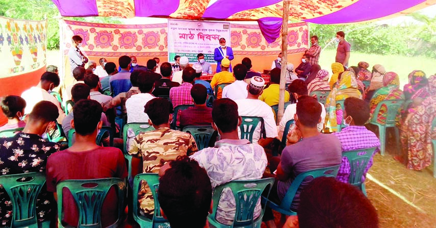 Agriculturist Hridayeshwar Dutta, Deputy Director, Department of Agricultural Extension, Patuakhali, speaks at the field day programme as the chief guest held in Kalapara Upazila of Patuakhali district recently.