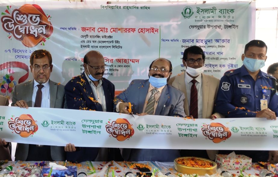 Md. Mosharraf Hossain, DMD of Islami Bank Bangladesh Limited, inaugurating its new sub-branch at Delduar in Tangail on Monday. Bashir Ahamed, Head of Mymensingh Zone, senior officials of the bank and local elites were also present.