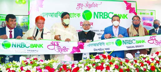 Md. Sanower Hossain, M.P of Tangail-5 inaugurating the new branch of NRB Commercial Bank Limited at Boro Kali Bari Road in Tangail on Wednesday as chief guest. S M Pavez Tamal, Chairman of the bank and local elites were also present.