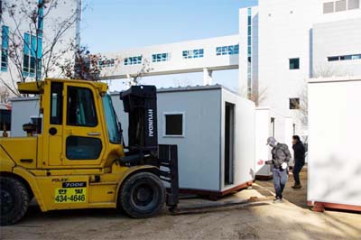 A temporary ward for coronavirus patients under construction outside the Seoul Medical Center in Seoul, South Korea.