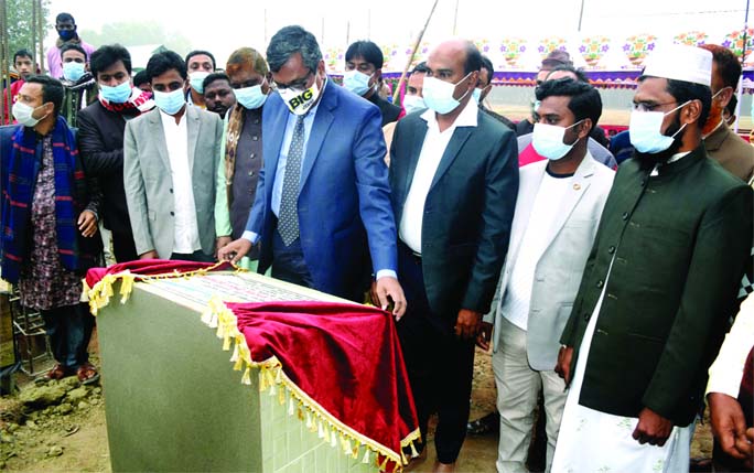 Advocate Emdadul Haque Selim, Member of Mymensingh District Unit Awami League, unveils the foundation stone of multistoried academic building of Islamia College in Fulbaria Poura Sadar in the district on Wednesday.
