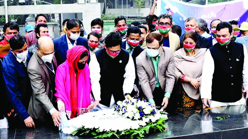 State Minister for ICT Division Zunaid Ahmed Palak pays floral tributes on the portrait of Father of the Nation Bangabandhu Sheikh Mujibur Rahman in the city's 32, Dhanmondi on Saturday on the occasion of Digital Bangladesh Day-2020.