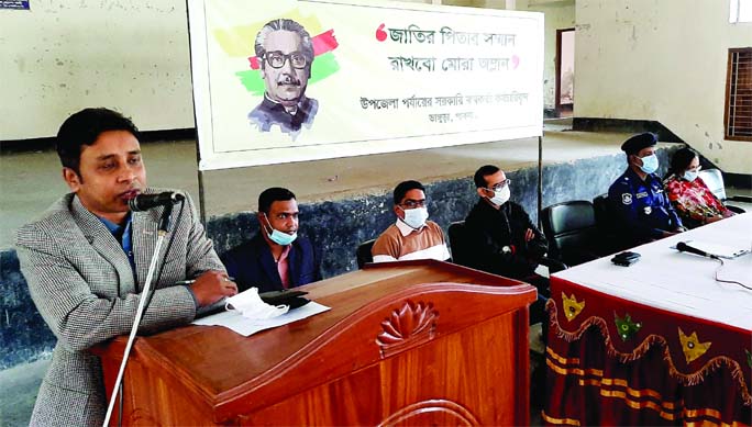 Bhangura (Pabna) UNO Syed Ashrafuzzaman speaks at a gathering of government officials and employees at Freedom Fighter Hossain Ali auditorium in the upazila on Saturday morning to curb anti-sculpture activities in the country and protect the honor of Fath