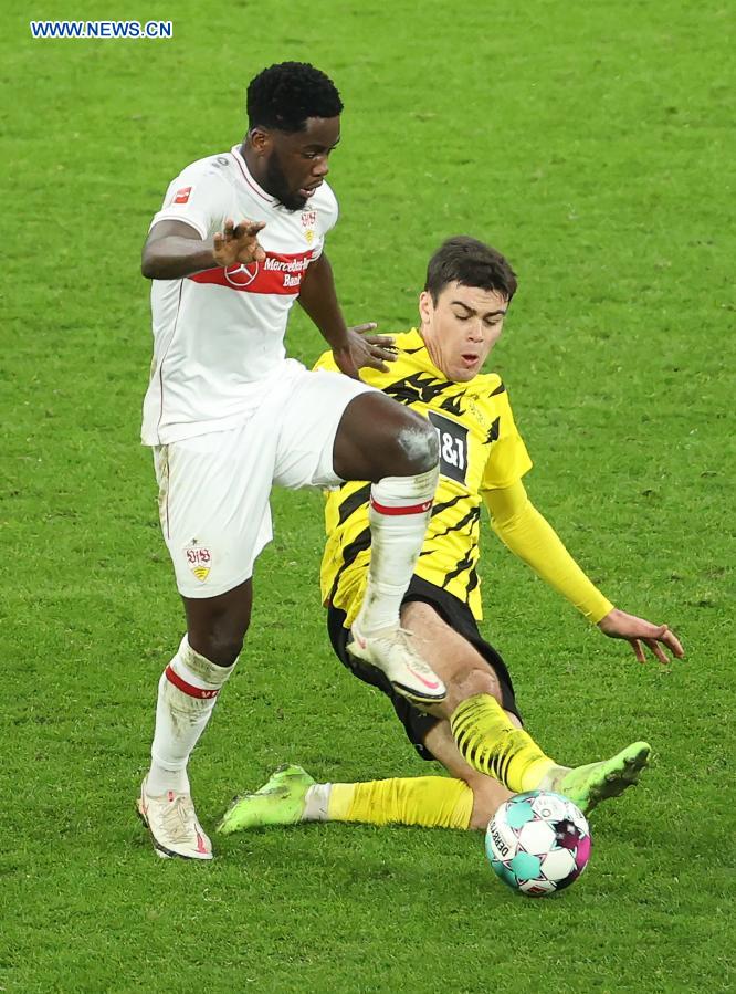 Giovanni Reyna (right) of Dortmund vies with Orel Mangala of Stuttgart during a German Bundesliga football match between Borussia Dortmund and VfB Stuttgart in Dortmund, Germany on Saturday.