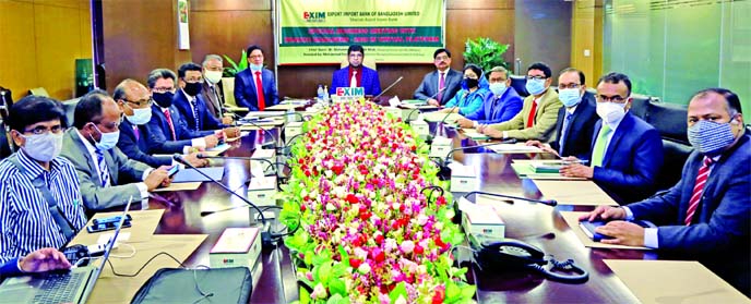 Dr Mohammed Haider Ali Miah, Managing Director of the Exim Bank Ltd, presiding over the bank's Special Business Meeting 2020 at the bank's corporate office in the city on Monday. AMD Md Feroz Hossain, DMDs Md Humayun Kabir, Shah Md. Abdul Bari and Shaik