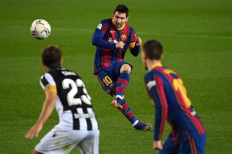 Barcelona's forward Lionel Messi kicks the ball during the Spanish league football match against Levante UD at the Camp Nou stadium in Barcelona on Sunday.