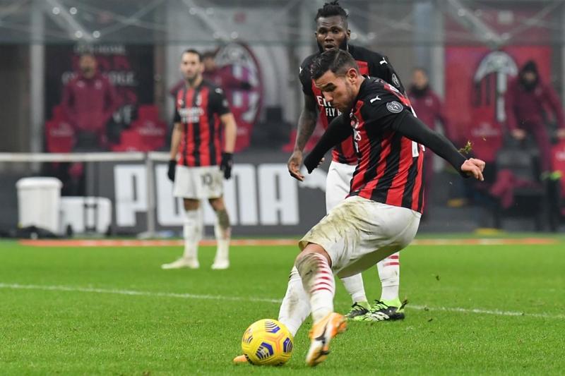 AC Milan's French defender Theo Hernandez shoots to score an equalizer during the Italian Serie A football match between AC Milan and Parma at the San Siro stadium in Milan on Sunday.