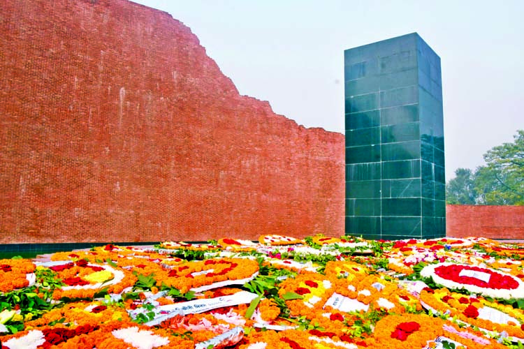 Wreaths of flowers pour in from people of all walks of life at the capital's Rayerbazar Killing Field on Martyred Intellectuals Day yesterday.