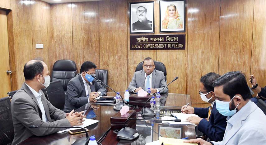 LGRD and Cooperatives Minister Tajul Islam exchanges views on Detailed Area Plan with the members of Bangladesh Institute of Planners at the conference room of Local Government Division in the city on Tuesday.