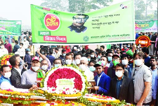 Mohammad Shahjahan, Managing Director (Additional Charge) of the Bangladesh House Building Finance Corporation, along with employees paying tribute to the valiant freedom fighters on the Victory Day by placing wreaths at the National Memorial at Savar on