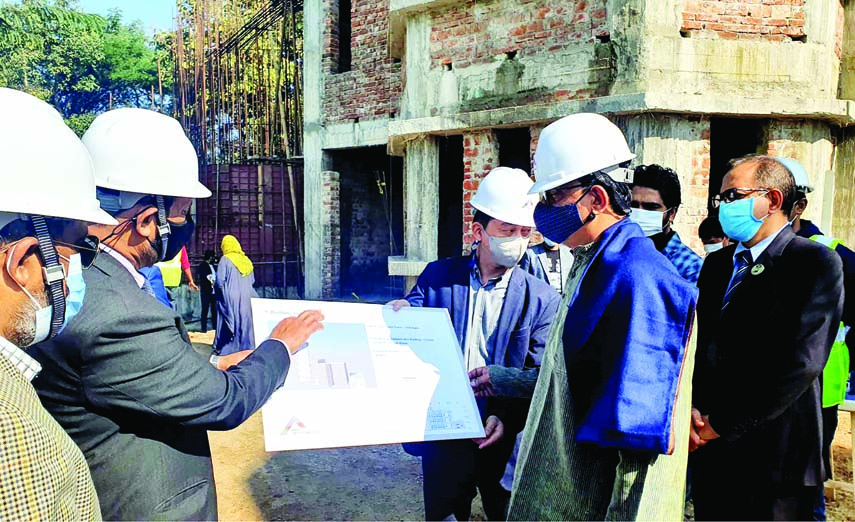 State Minister for Shipping Khalid Mahmud Chowdhury inspects the under construction light house and coastal radio station in Cox's Bazar on Monday.