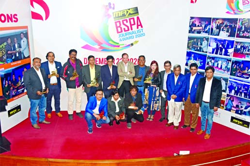 The winners of the MAX-BSPA Journalist Award ceremony with the chief guest Secretary General of Bangladesh Olympic Association (BOA) Syed Shahed Reza and the officials of Bangladesh Sports Press Association (BSPA) pose for a photo session at the Dutch-Ban
