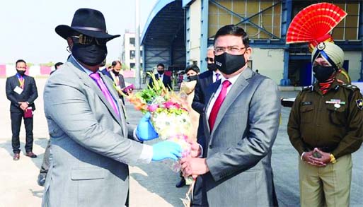 BSF Director General Rakesh Asthana welcomes his BGB counterpart Major General M Shafeenul Islam with bouquet when the latter with his team reached Guwahati in Assam on Tuesday.