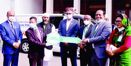 Leaders of BARVIDA hand over key of the ambulance to Prime Minister's Principal Secretary Dr. Ahmad Kaikaus for humanitarian activities at a ceremony held at the PMO on Tuesday.