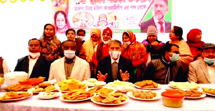 Nurul Amin Ruhul speaks at a 'Pitha Utsab' at Matlab Uttar Upazila in Chandpur as chief guest on Sunday organized by local Mohila League. Upazila Chairman M A Kuddus and UNO Snehashis were also present.
