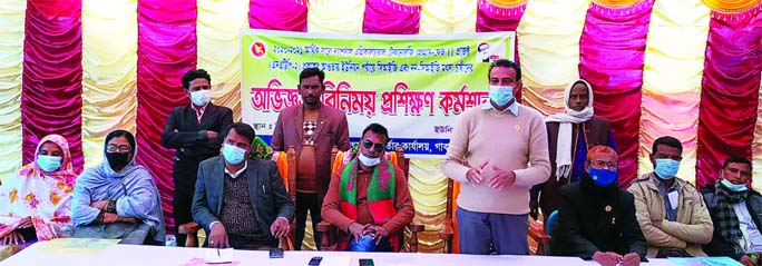 Gabtoli upazila (Bogura) Fisheries Officer Arif Ahmed speaks at a training programme of fish farmers and field day under the National Technology Agriculture Programme (Phase-2) at the Kagil Madrasha Field in the upazila on Tuesday.