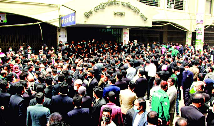 Lawyers of Dhaka Bar Association lodge a massive protest in front of Chief Metropolitan Magistrate (CMM) Court in Dhaka on Wednesday demanding withdrawal of a magistrate.