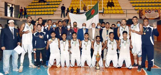 Bangladesh Navy, the champions in the Bangabandhu Victory Day Basketball Tournament with the chief guest Secretary General of Bangladesh Olympic Association Syed Shahed Reza and the officials of Bangladesh Navy and Bangladesh Basketball Federation pose fo