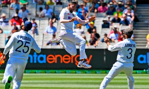 India's Mohammed Siraj (center) celebrates dismissing Australia's Marnus Labuschagne on the first day of the second cricket Test match between Australia and India played at the MCG in Melbourne on Saturday.