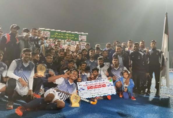 Bangladesh Navy players celebrate winning the Mujib Barsho Walton Victory Day Hockey tournament 2020 at Maulana Bhasani National Hockey Stadium in Dhaka on Sunday.