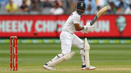 Stand-in skipper Ajinkya Rahane plays one to the third man region during his dominating century against Australia in Melbourne on Sunday.