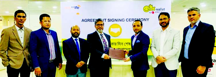 Gazi Yar Mohammed, Head of MFS & Agent Banking of ONE Bank Limited and MM Monirul Alam, Managing Director & CEO of Guardian Life Insurance Limited, exchanging an agreement signing document at the bank head office in the city recently. Under the deal, both