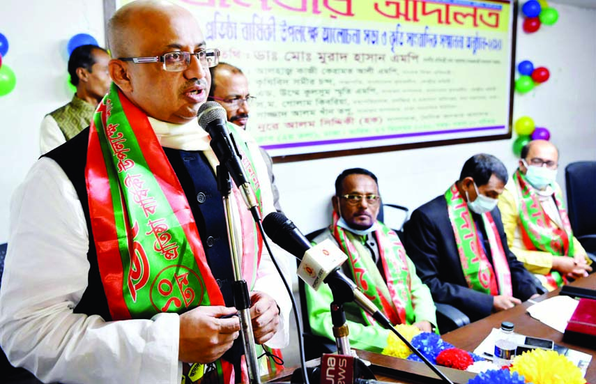 State Minister for Information Dr Md. Murad Hassan speaks at a discussion meeting marking the founding anniversary of 'Dainik Jonoter Adalot' at the Jatiya Press Club on Sunday.