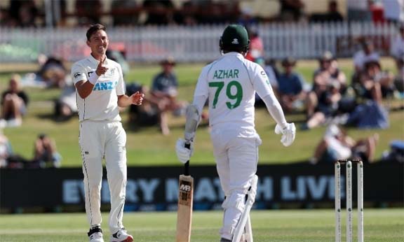 New Zealand's paceman Trent Boult (left) reacts after bowling to Pakistan's batsman Azhar Ali (right) on the fourth day of the first cricket Test match between New Zealand and Pakistan at the Bay Oval in Mount Maunganui on Tuesday.