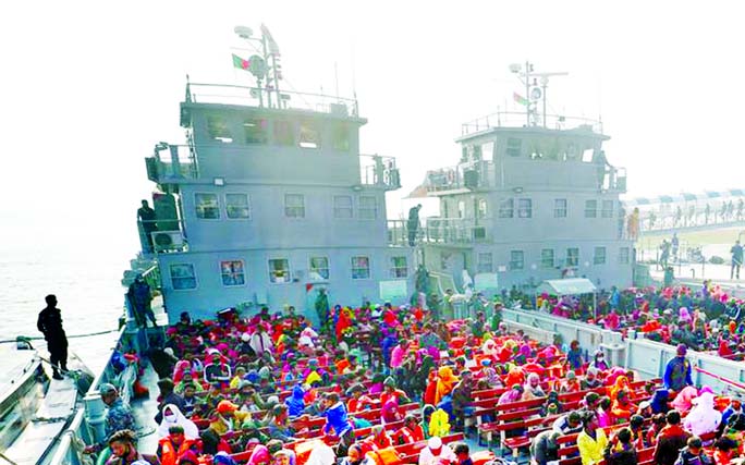 Rohingyas prepare to board a ship as they move to Bhasan Char Island near Chattogram on Tuesday.