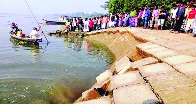Meghna-Dhonagoda Dam has been devoured by Meghna river again at Janata Bazar area in Matlab Uttar of Chandpur.