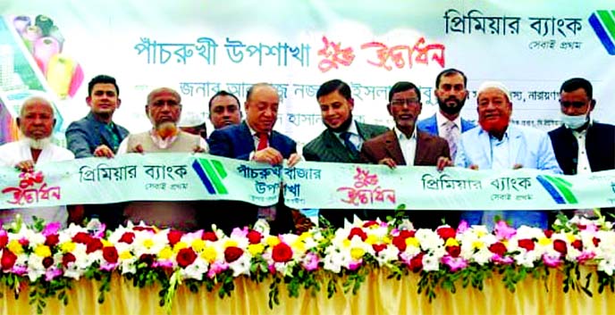 Sami Karim, DMD of Premier Bank Limited, inaugurating its Panchrukhi sub branch at Araihazar in Narayanganj recently. Local businessmen and elites were also present.