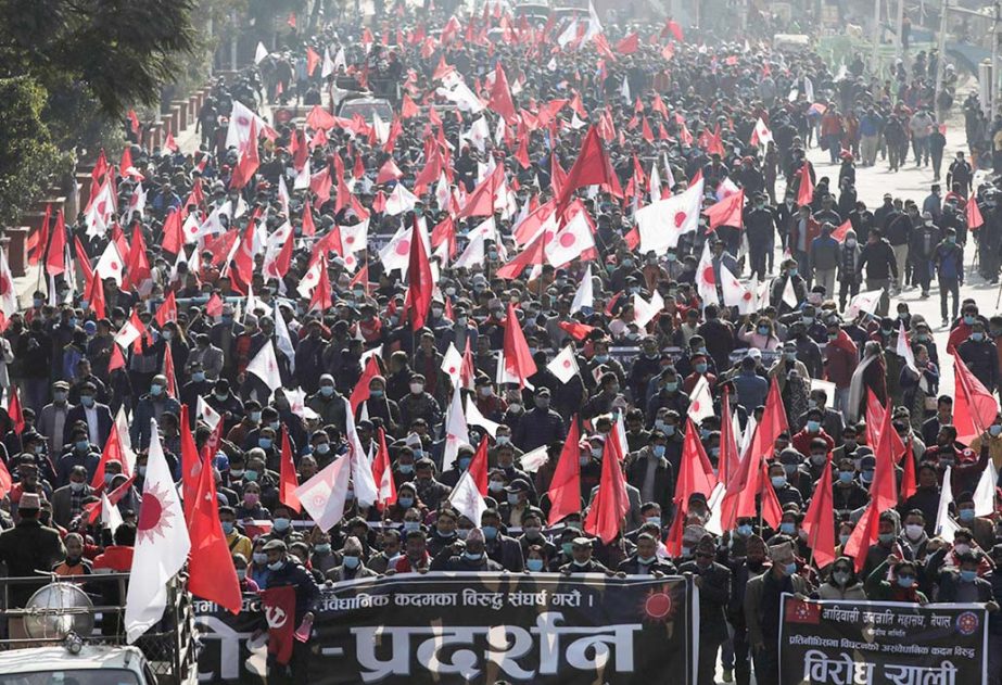 Protesters affiliated with a faction of the ruling Nepal Communist Party take part in a rally against the dissolution of parliament, in Kathmandu, Nepal.