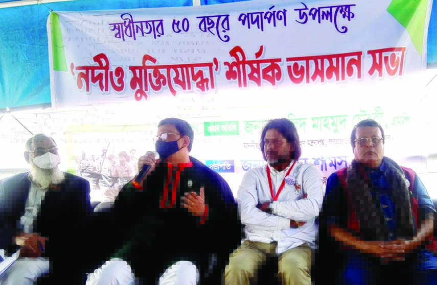 State Minister for Shipping Khalid Mahmud Chowdhury speaks at a meeting titled 'River and Freedom Fighters' in the city's Sadarghat area on Thursday marking 50th anniversary of the Independence.