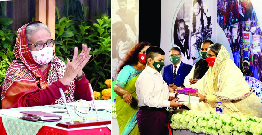 On behalf of Prime Minister Sheikh Hasina, Education Minister Dr. Dipu Moni distributes textbooks free of cost among the students at Bangabandhu International Conference Center in the city on Thursday. Prime Minister inaugurates the event through video co