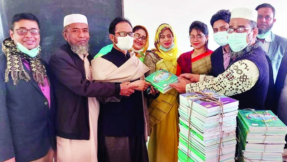 The authority concerned distributes new books among the students and guardians. The snap was taken from the city's Ahmed Bawani Academy School and College on Friday, the first day of the New Year-2021.