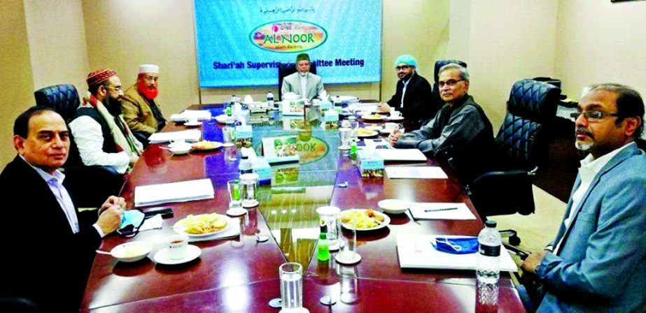 Md. Fariduddin Ahmed, Chairman of the Shari'ah Supervisory Committee of ONE Bank Limited, presiding over its meeting at the bank head office in the city on Tuesday. ASM Shahidullah Khan, Chairman, M. Fakhrul Alam, Managing Director of the bank, Prof. Dr