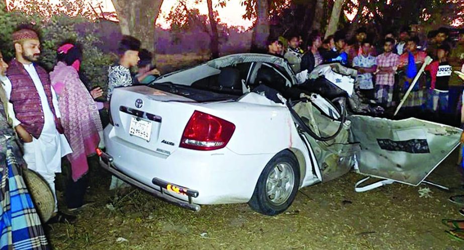 A car gets smashed after a head-on collision with a truck on the Dhaka-Sylhet Highway at Belabo in Narsingdi on Friday.