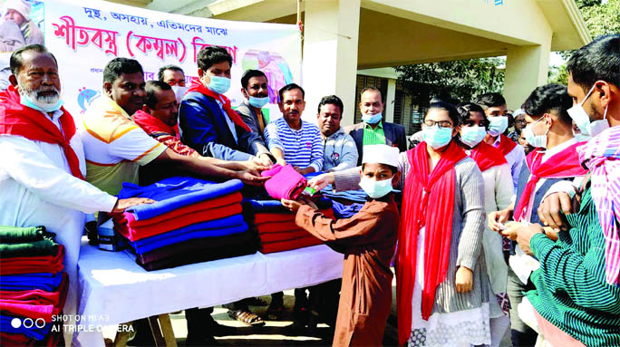 Mohammad Tajul Islam, Upazila Nirbahi Officer (UNO) of Gafargaon (Mymensingh) distributes blankets, masks and soap among the disabled, children and the poor at a ceremony at Dakbanglo ground in the upazila on Saturday.