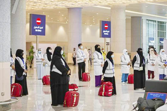 Passenger queue up at King Abdulaziz Airport in Saudi Arabia.