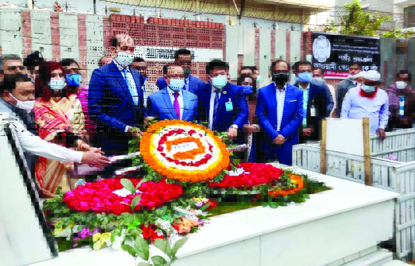 Local Government, Rural Development and Co-operatives Minister Md Tajul Islam pays floral tribute to the grave of Syed Ashraful Islam marking his 2nd death anniversary at Banani Grave Yard in the capital on Sunday.