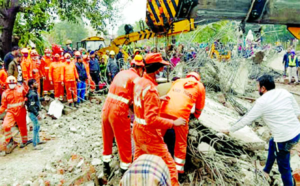 Search and rescue operation by NDRF in Muradnagar, Uttar Pradesh, India on Sunday.