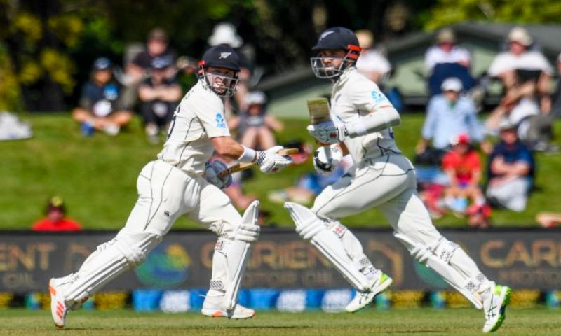 New Zealand batsmen Henry Nicholls (left) and Kane Williamson run between the wickets during play on day two of the second cricket Test between Pakistan and New Zealand at Hagley Oval, Christchurch, New Zealand on Monday.