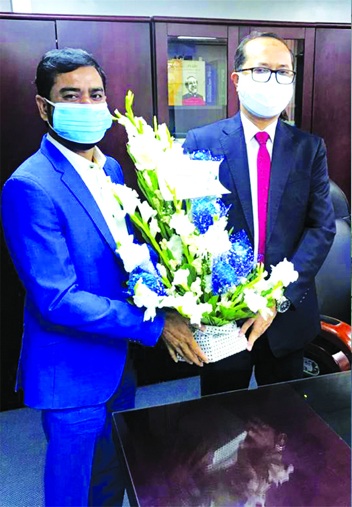 Chairman of Minister Group and Director of FBCCI, M A Razzak Khan Raj congratulates newly appointed Managing Director of Islami Bank Bangladesh Mohammad Munirul Maula at the banks head office in the city recently. They also congratulate the newly appointe