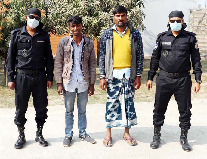 RAB-2 detains two drug peddlers with huge phensidyl from the city's Shyamali Ring Road area on Friday.