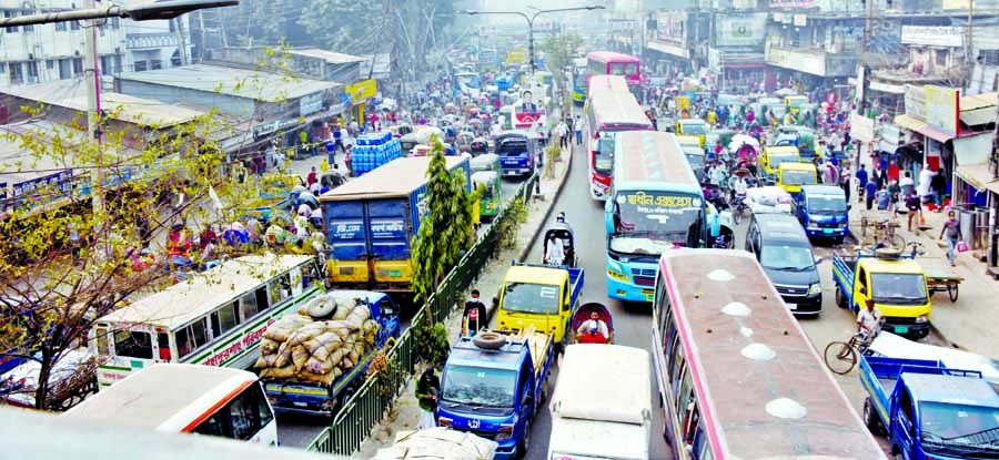 Vehicles get stuck on key roads in Dhaka city on Sunday as the capital was blighted by severe traffic jam on the first working day of the week. This snap was taken from the capital's English Road.