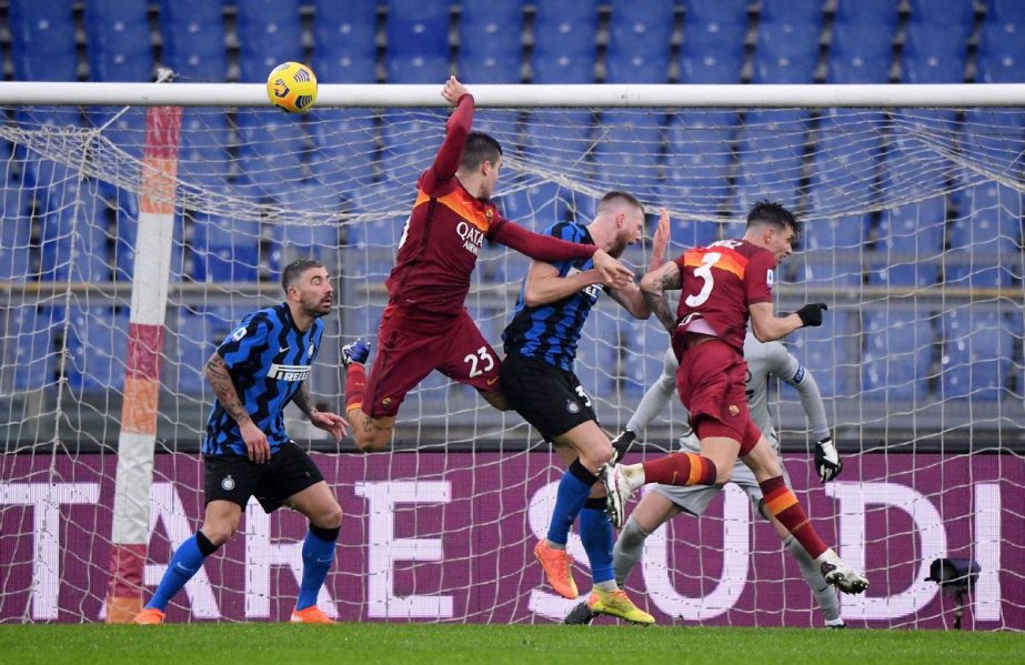 Roma's Gianluca Mancini (left) scores their second goal during Serie A match between Roma and Inter Milan at Stadio Olimpico, Rome, Italy on Sunday.